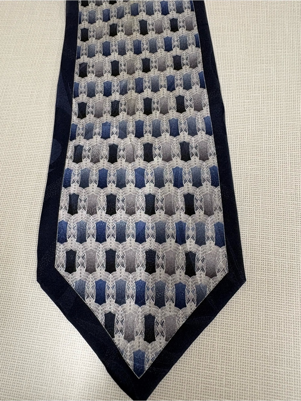 dino bassi Men's Tie 100% silk Blue, silver, gray geometric design 57" x 4"